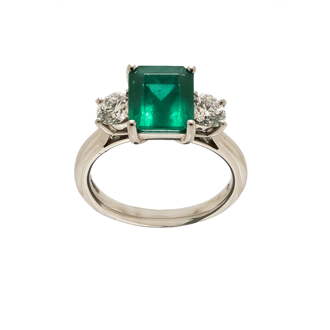 Preowned emerald and diamond ring